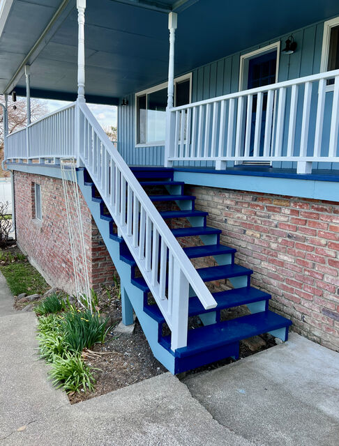 Exterior staircase repainted in blue